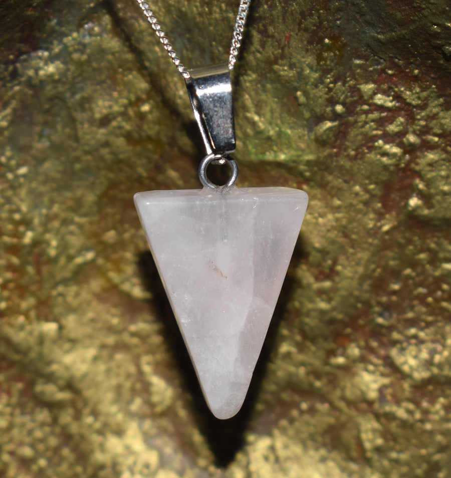 Rose quartz crystal triangle trinity pendant on sterling silver chain with bronze background
